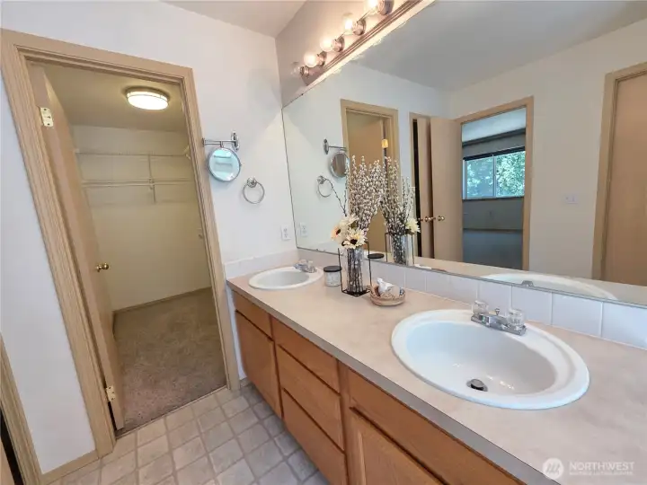 Main bedroom walk in closet in the main bathroom.