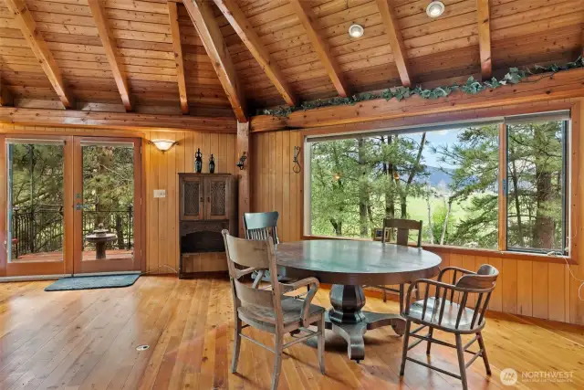 Tree house dining overlooking the river