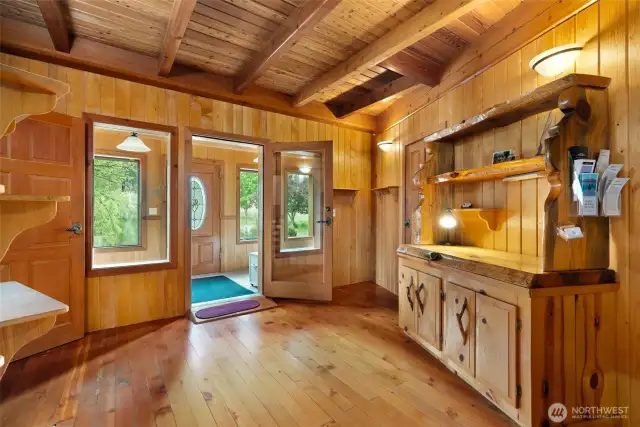 Fully enclosed Porch leads to main entry