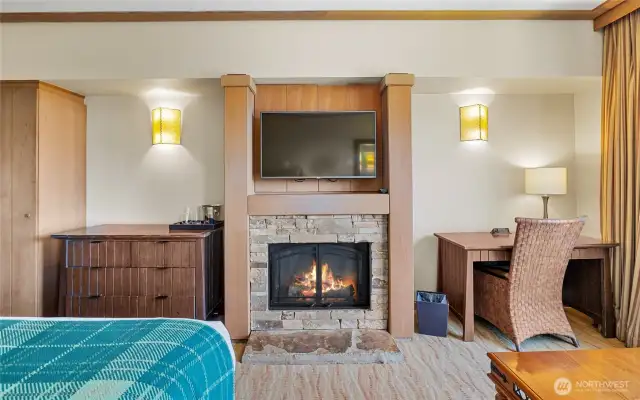 Cozy real stone fireplace.