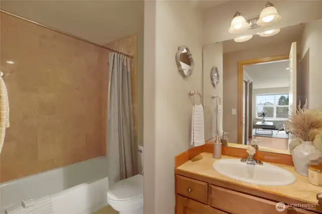 Not just a half bath like in most townhomes, this full bathroom on the main level creates all kinds of floorplan flexibility.