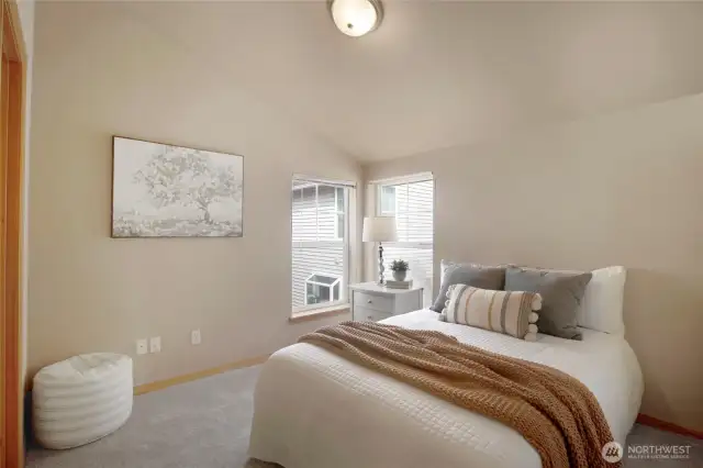 This home basically has two primary bedrooms.  This is the second bedroom upstairs also complete with an ensuite bathroom.