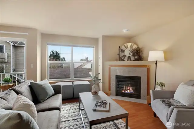 The beautiful gas fireplace is the perfect focal point for the living room.