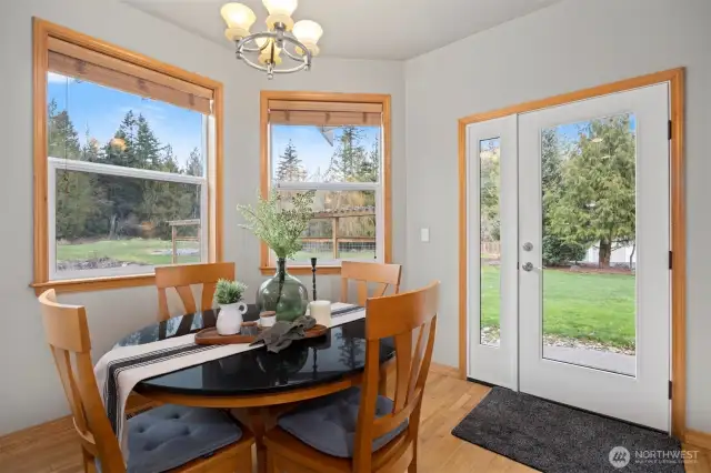 Dining nook with door to back patio.