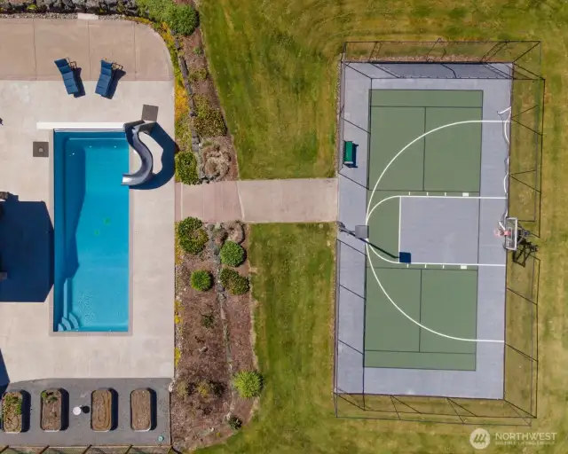 Fenced sports court all ready for your own pickleball tournaments.