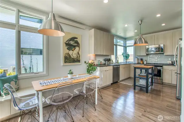 In addition to the ample cabinet space, the  banquette seating provides extra storage.
