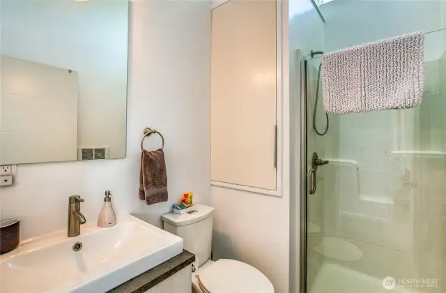 The primary ensuite bath has a vaulted ceiling for a luxurious spa-like experience.