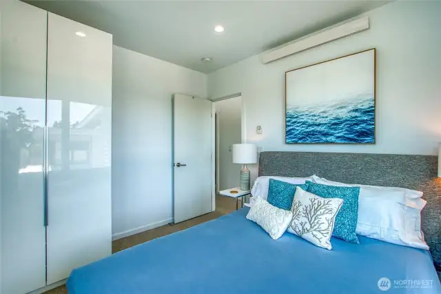 Built-in closets grace and second bedroom with ample storage.