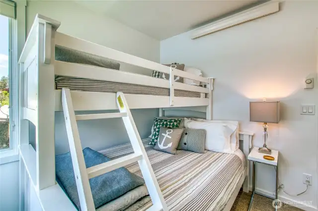 Third bedroom bunk beds maximize sleeping space and potential number of guests.