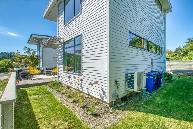 There is lawn space around the home for play space.