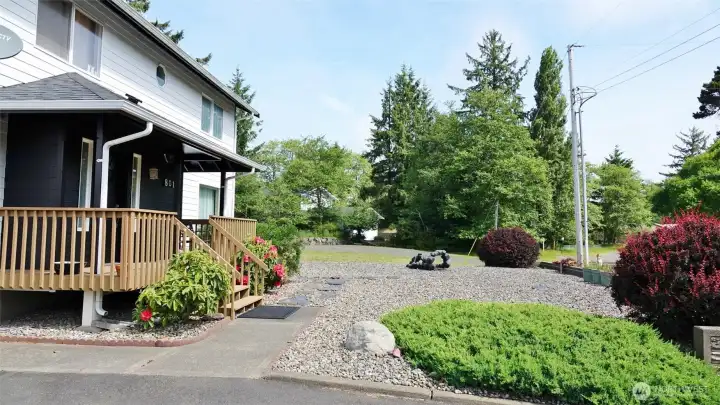 Low-maintenance landscaping in the front yard.