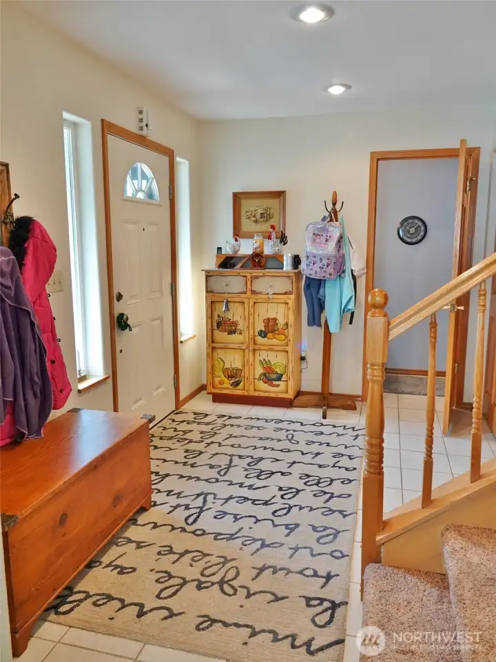Entry w/ tile floors.