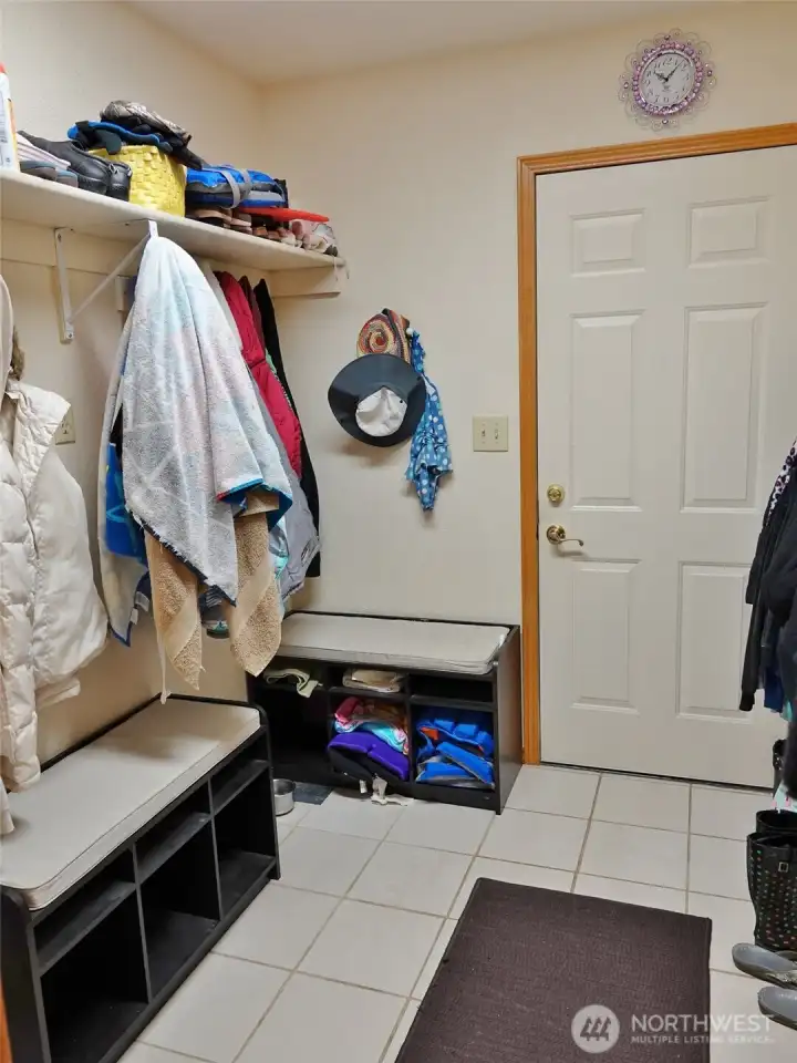 Downstairs Mud Room/Laundry Room leading into the Garage. (There is another Laundry Room upstair.)