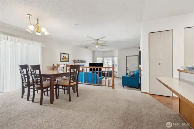 Kitchen bar space seen to the right. Dining area is large enough for big tables or divide the space up for other uses