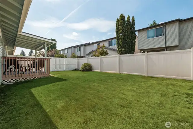 Large fully fenced back yard that the gras is maintained by the association