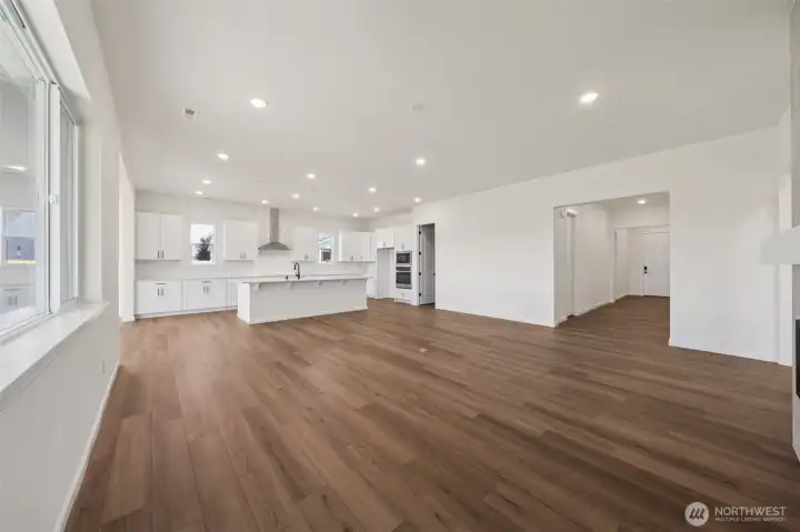 This home has a different color cabinet that is called Artic Grey stain - with a color palate of light grey flooring a grey tile. NOT ACTUAL HOME but represents the layout.