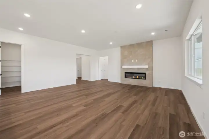 This home has a different color cabinet that is called Artic Grey stain - with a color palate of light grey flooring a grey tile. NOT ACTUAL HOME but represents the layout.