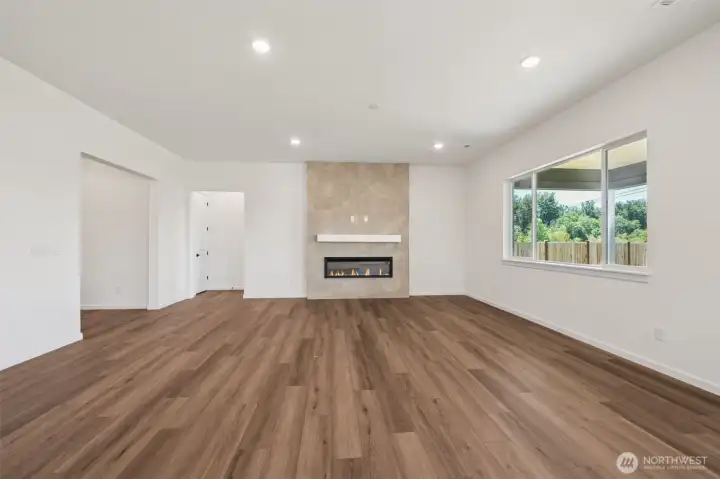 This home has a different color cabinet that is called Artic Grey stain - with a color palate of light grey flooring a grey tile. NOT ACTUAL HOME but represents the layout.