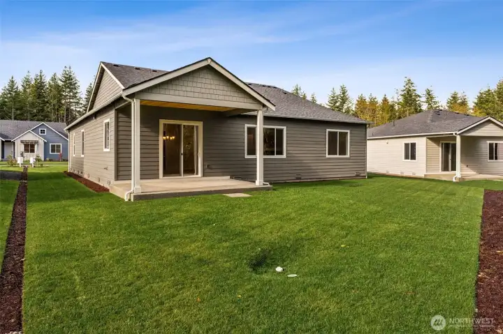 ***Actual Home***  Backyard with covered patio