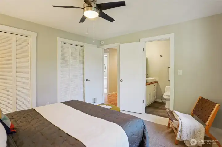 Main floor primary bedroom with en-suite full bath