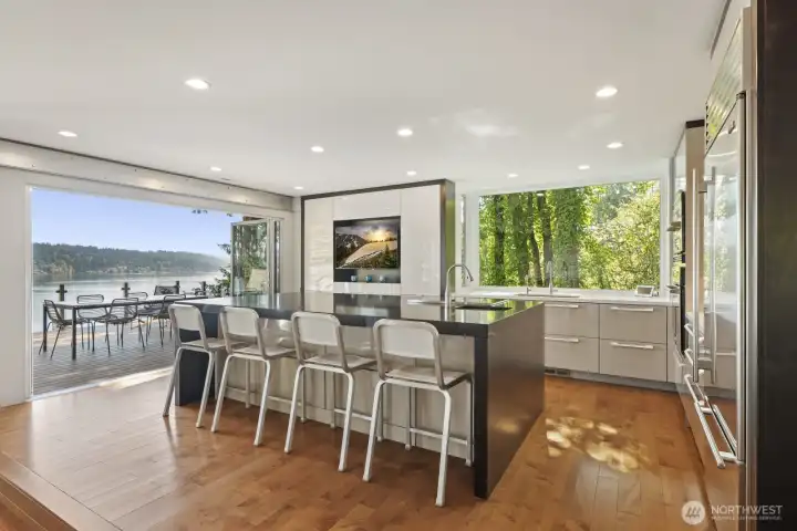 Open kitchen in a light filled space where lake and mountain views take center stage.