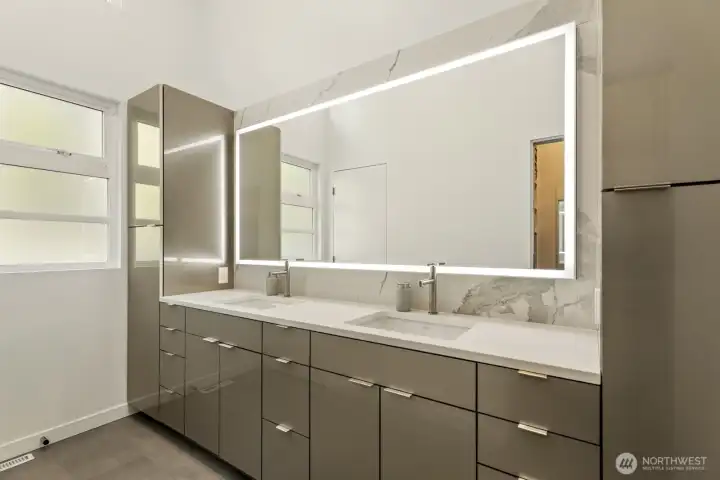 Primary bath with sleek modern designed dual vanity