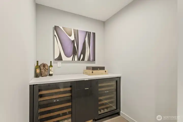 Lower level wine/beverage bar with adjacent full size temperature controlled wine cabinet (not shown here).
