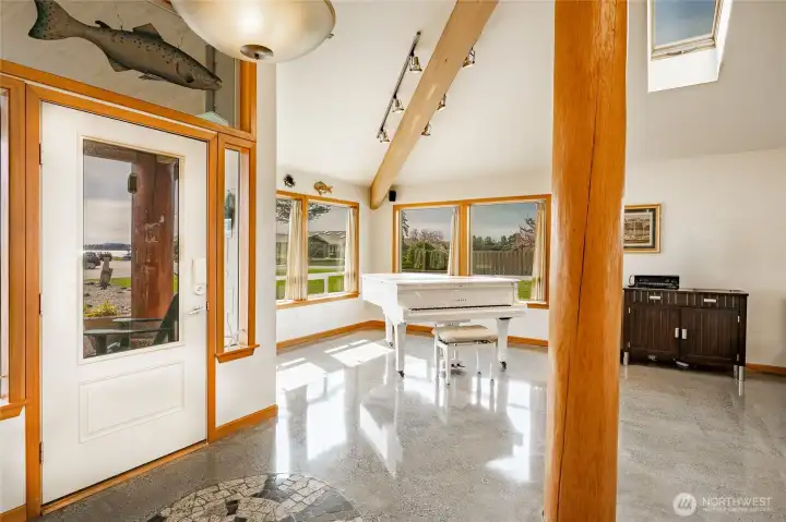 Polished Terrazzo Floors showcase the homes interior spaces and are easy to maintain and compliment the solid wood elements that reflect the best in Northwest Design.