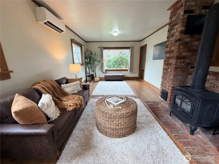 Natural light fill this room from a large picture window plus 3 additional windows.