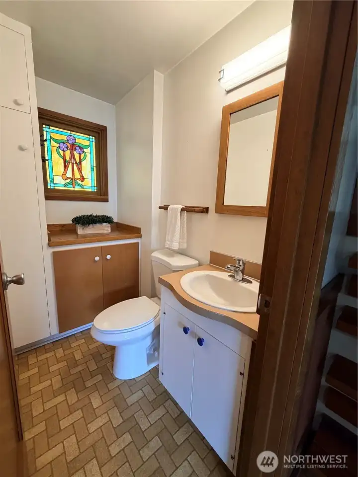 This is the 1/2 bathroom on the main floor next to the kitchen.