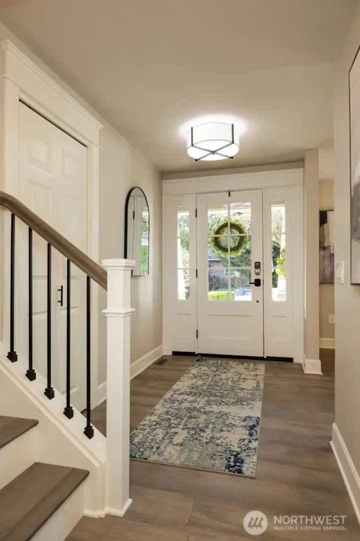 Entry way with coat closet.