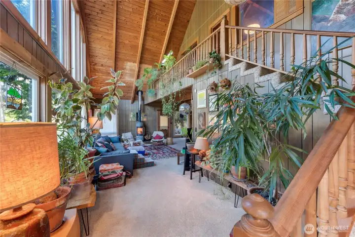 Stairs leading to the private primary bedroom and bathroom