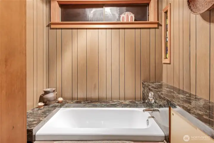 Soaking tub in guest bathroom