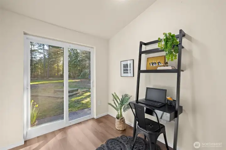 Den w/patio access.  Possible mud room