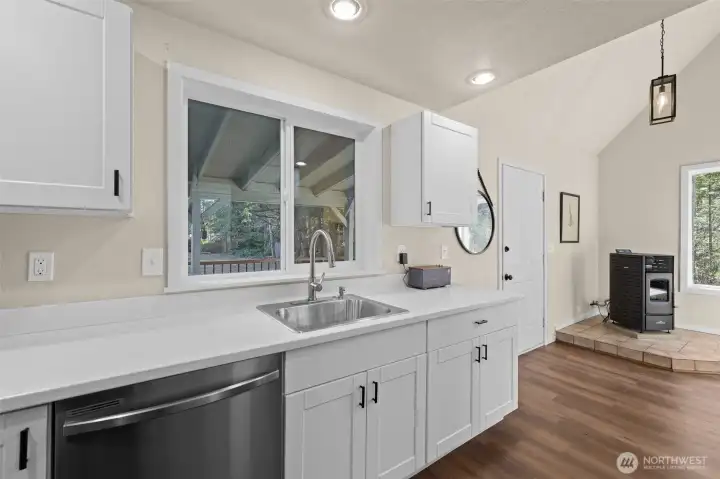 Window looks out to the expansive yard.