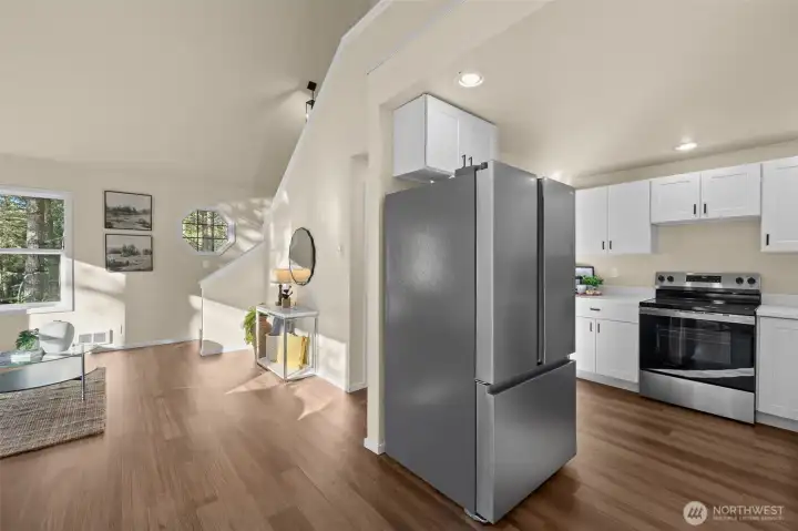 Open kitchen to dining & living rooms.