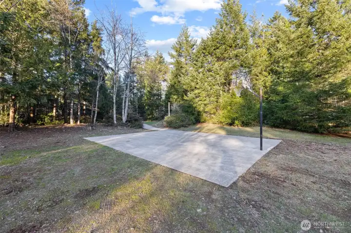 Concrete sport court  Possible future garage