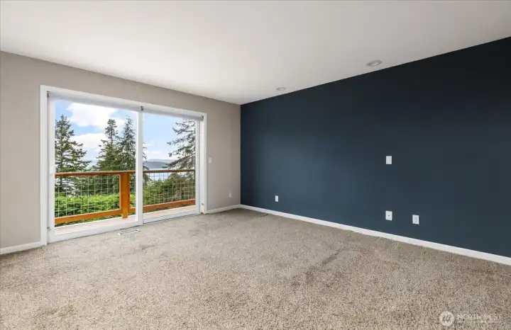 Primary bedroom with viewing deck (unstaged)