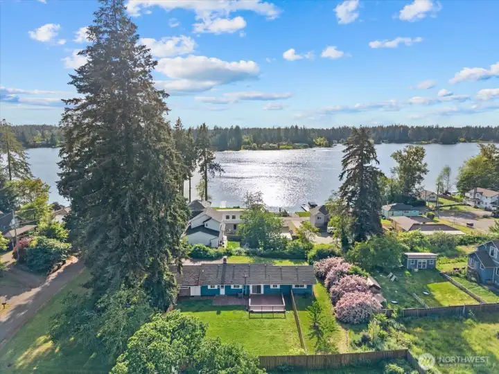 House is 1 block from Spanaway Lake with a huge lot