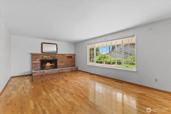 Living Room with gleaming original wood floors