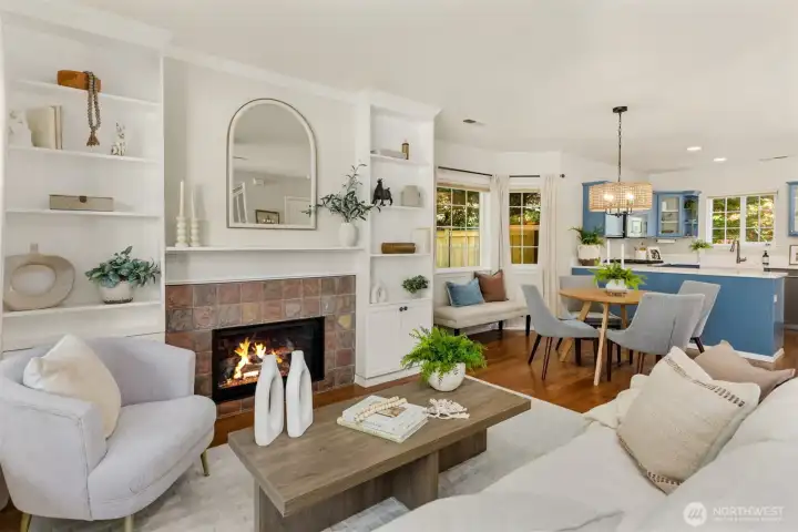 The living room fireplace surround has been updated with added built-ins. The living room fireplace surround has been updated with added built-ins.