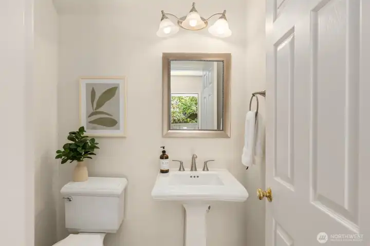The half bath on the main floor is right by the back door and office. The half bath on the main floor is right by the back door and office.