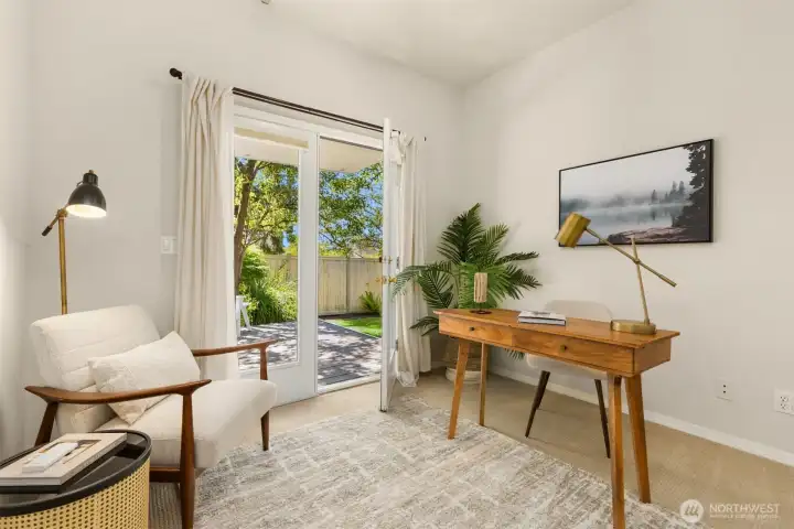 This flex space is great as a home office and could also be a fabulous art studio. French doors open to the lower back deck. This flex space is great as a home office and could also be a fabulous art studio. French doors open to the lower back deck.
