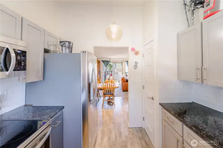 Beautifully updated Kitchen with stainless steel appliances and granite countertops
