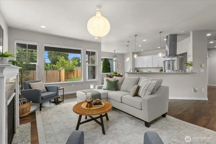 The heart of the home blends living, dining, and kitchen spaces into one seamless setting designed for connection and everyday comfort. The heart of the home blends living, dining, and kitchen spaces into one seamless setting designed for connection and everyday comfort.