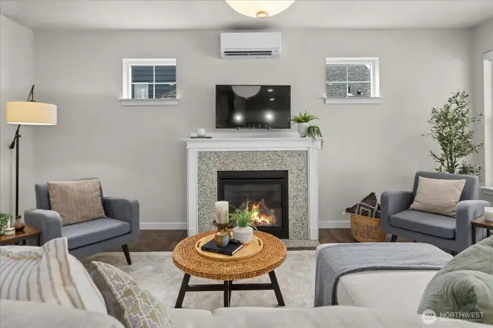 A warm focal point anchors the living space, creating the perfect backdrop for relaxing after a busy day. A warm focal point anchors the living space, creating the perfect backdrop for relaxing after a busy day.