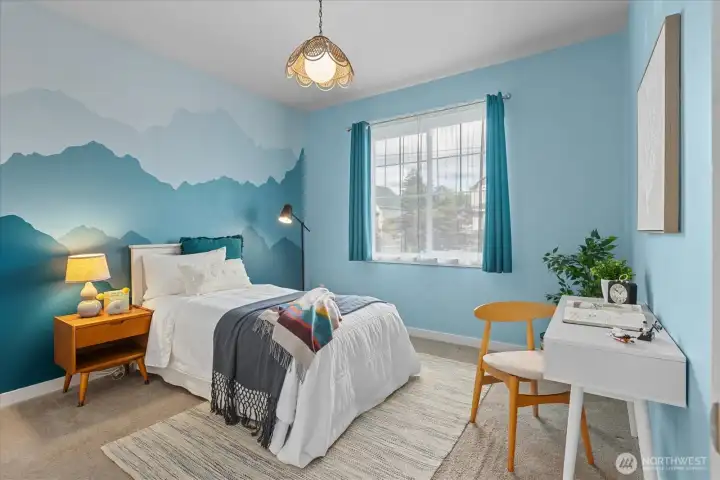 Comfortable and welcoming, this bedroom offers a peaceful place to recharge at the end of the day. Comfortable and welcoming, this bedroom offers a peaceful place to recharge at the end of the day.
