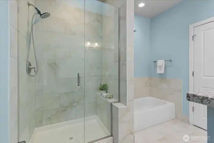 Your own private escape, featuring a soaking tub and separate shower for the perfect blend of comfort, convenience, and everyday luxury. Your own private escape, featuring a soaking tub and separate shower for the perfect blend of comfort, convenience, and everyday luxury.