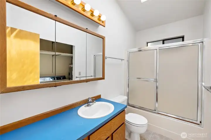 Full bathroom with laundry
