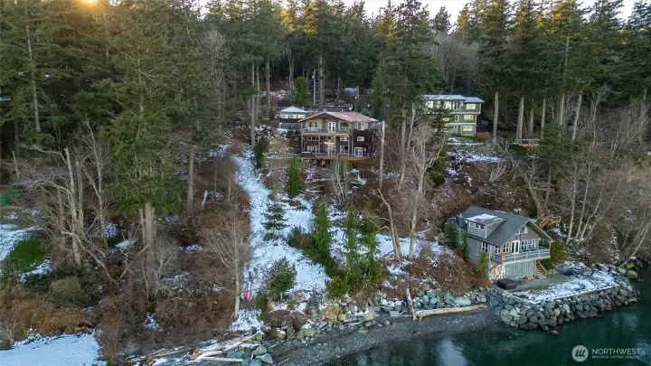 The home has a lovely trail down to the beach where you can dig for clams and pick oysters at low tide. The home has a lovely trail down to the beach where you can dig for clams and pick oysters at low tide.
